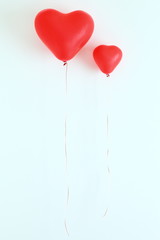 Obraz na płótnie Canvas Red heart shaped balloons