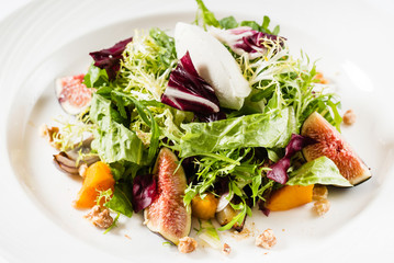 fresh salad with fig and persimmon