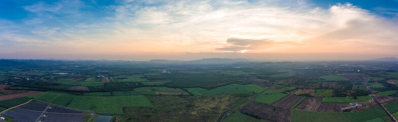 Fototapeta na wymiar Aerial View of a Green Rural Area under Blue Sky, Panorama View