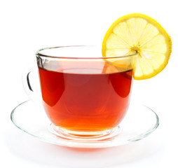 Isolated transparent cup of tea with lemon slice