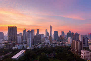 Aerial view of Bangkok modern office buildings, condominium in Bangkok city downtown with sunset sky ,Bangkok is the most populated city in Southeast Asia. Bangkok , Thailand