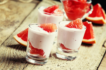 Cottage cheese mousse with cream and grapefruit, vintage wooden