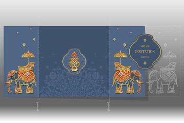 Indian wedding Invitation card templates with gold Elephant patterned and crystals on paper color.	