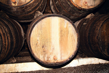 Wine barrels in an underground cellar