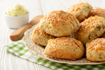 Homemade fresh wholegrain bread buns with cheese and garlic butter. 