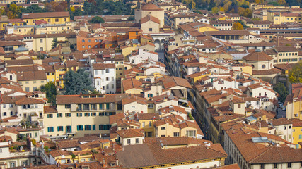Fototapeta na wymiar Red roofs of old houses Florence seen from the observation platform Duomo, Cathedral Santa Maria del Fiore.