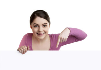 woman excited pointing looking down  © Kateryna