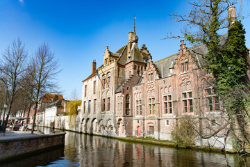 Historic brick house in Bruges with beautiful canal