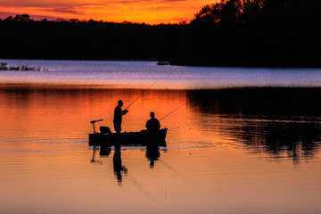 Fisherman on Great Pond at Sunset