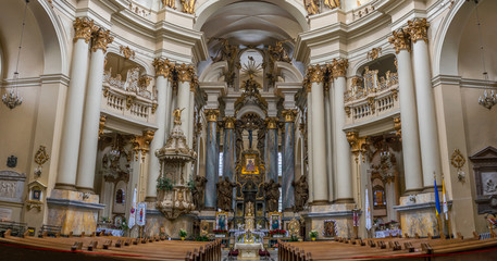 Fototapeta na wymiar Inside a church - interior decoration of ancient cathedral