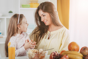 Mother And Daughter In The Kitchen