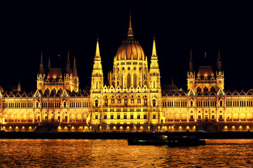 Fototapeta na wymiar Budapest Parliament in Hungary at night on the Danube river