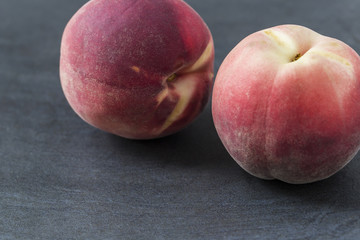 Fresh White Peach on the slate background