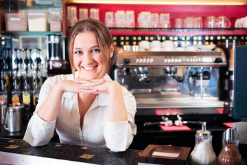 Friendly Bartender At A Cafe