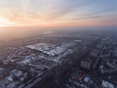 Huge supermarket in Kiev, Ukraine. Aerial view of mall at sunset time.