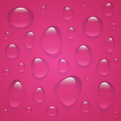 Clear transparent water drops isolated on the red background.