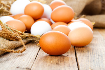 Eggs on wooden background