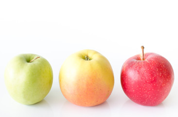 Three apples on a white background