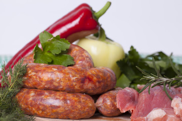 raw homemade sausages and fresh pork