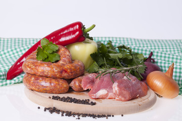 raw homemade sausages and fresh pork