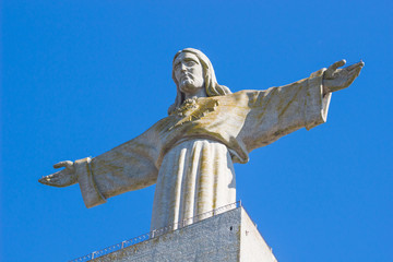 Lisbon, Portugal - June 20, 2016 statue of Christ (Cristo-Rei) or christ the king in lisbon portugal in blue sky background /  monument of Jesus  (Almada)