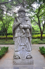 Fototapeta na wymiar Statue of General in the sacred way in Ming Xiaoling Mausoleum, Nanjing, Jiangsu Province, China. Ming Xiaoling Mausoleum is a UNESCO World Heritage Site.