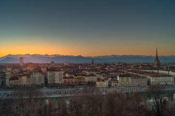 Obraz premium panorama of the city of turin from above at sunset with mole Antonelliana