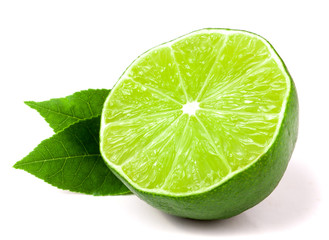half a lime with leaves isolated on white background