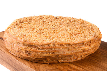 napoleon cake on a cutting board isolated  white background