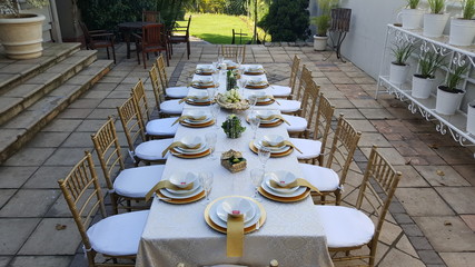 Wedding Table Layout with gold and White Decor