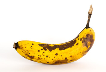rotten banana on white background / old banana on white background / Overripe banana on white...