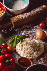 Dough with spices is being prepared to bake
