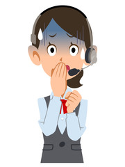 ヘッドセットを装着した制服着用の女性会社員が青ざめる
