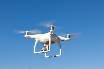 White copter hovers