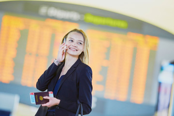 Young business woman in international airport