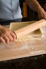 placing dough into tart pan