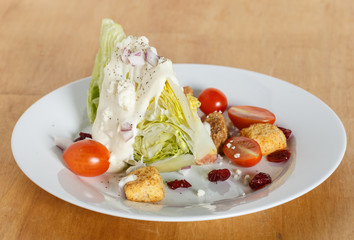 wedge salad on white plate
