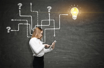 Girl with a tablet and an arrow maze