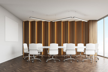Conference room with panels and poster