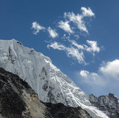 Fragment of the snow ridge in the massif of wall Nuptse massif from slope of the Kala Patthar -...