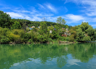 Fototapeta na wymiar Aare river in Switzerland, view from the town of Aarau