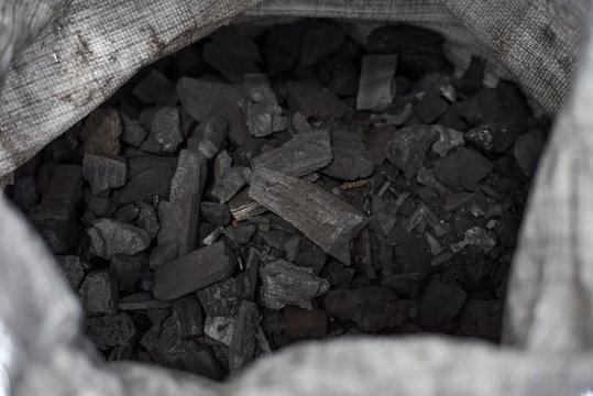 Black charcoal in the charcoal factory texture background