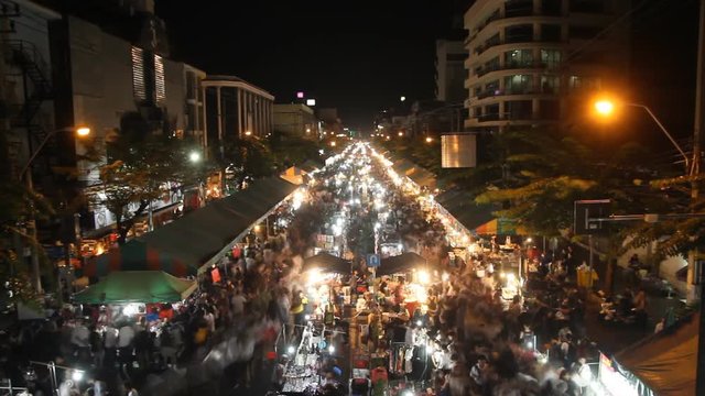 Crowd walking on street market in Bangkok, Thailand, time lapse
