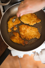 fried pork chops in the pan