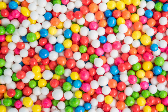 Colorful background texture with sugar candy sprinkles dot