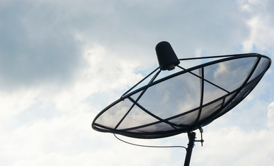 Silhouette Satellite dish communication technology network on the roof