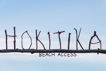 driftwood letters at Hokitika beach in New Zealand