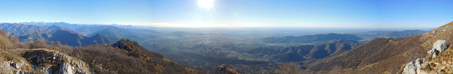 Fototapeta premium Great landscape with fantastic blue sky on the Orobie Alps and Padana plain a dry winter season without snow. Panorama from Linzone Mountain, Bergamo, Italy. 