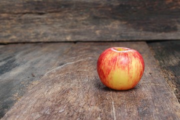 Red Apple Close up, on wooden background and copy space.