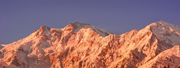 beautifull cloudy sunrise in the mountains with snow ridge